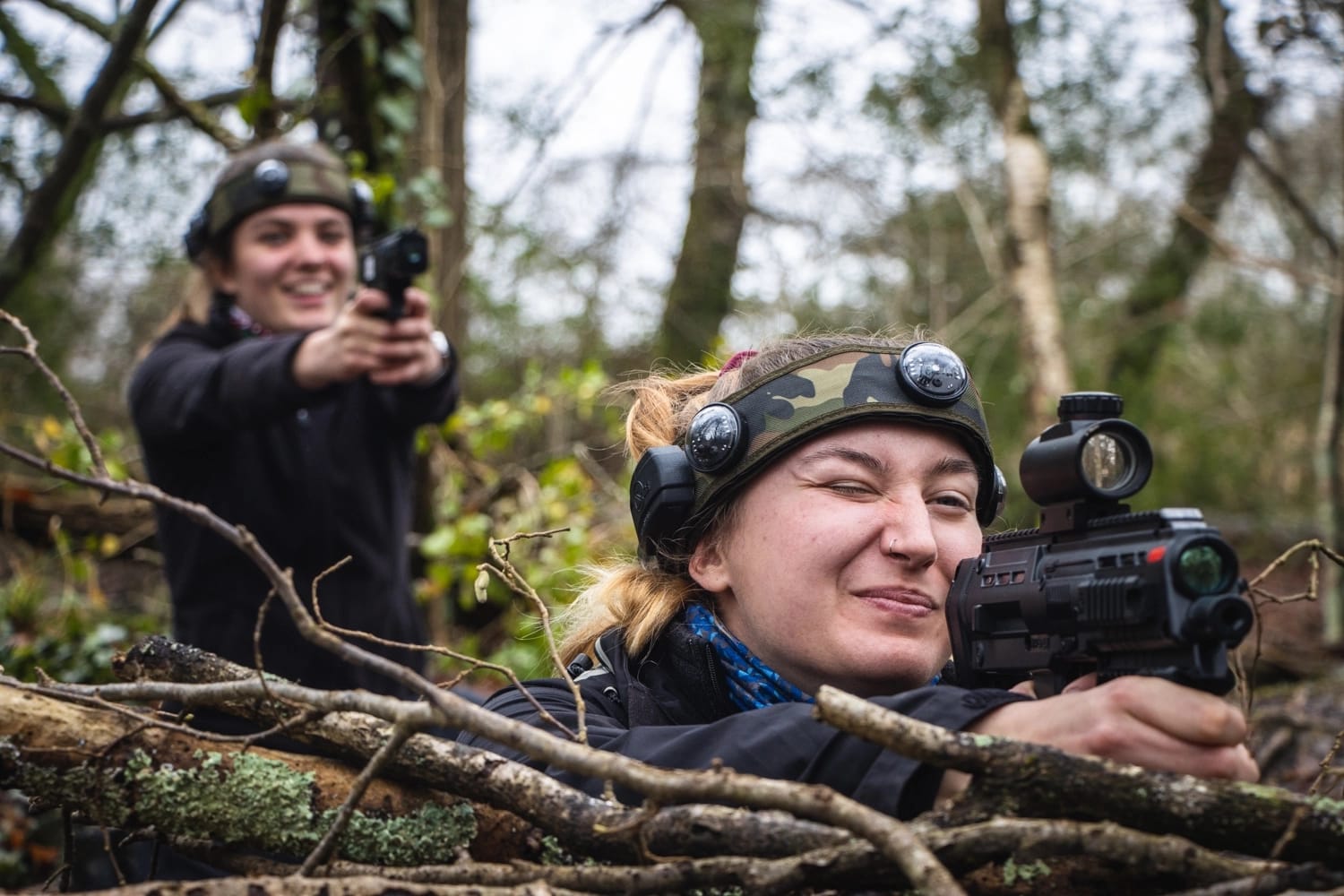 A couple playing Battlefield LIVE after looking for fun activities for couples in The New Forest.