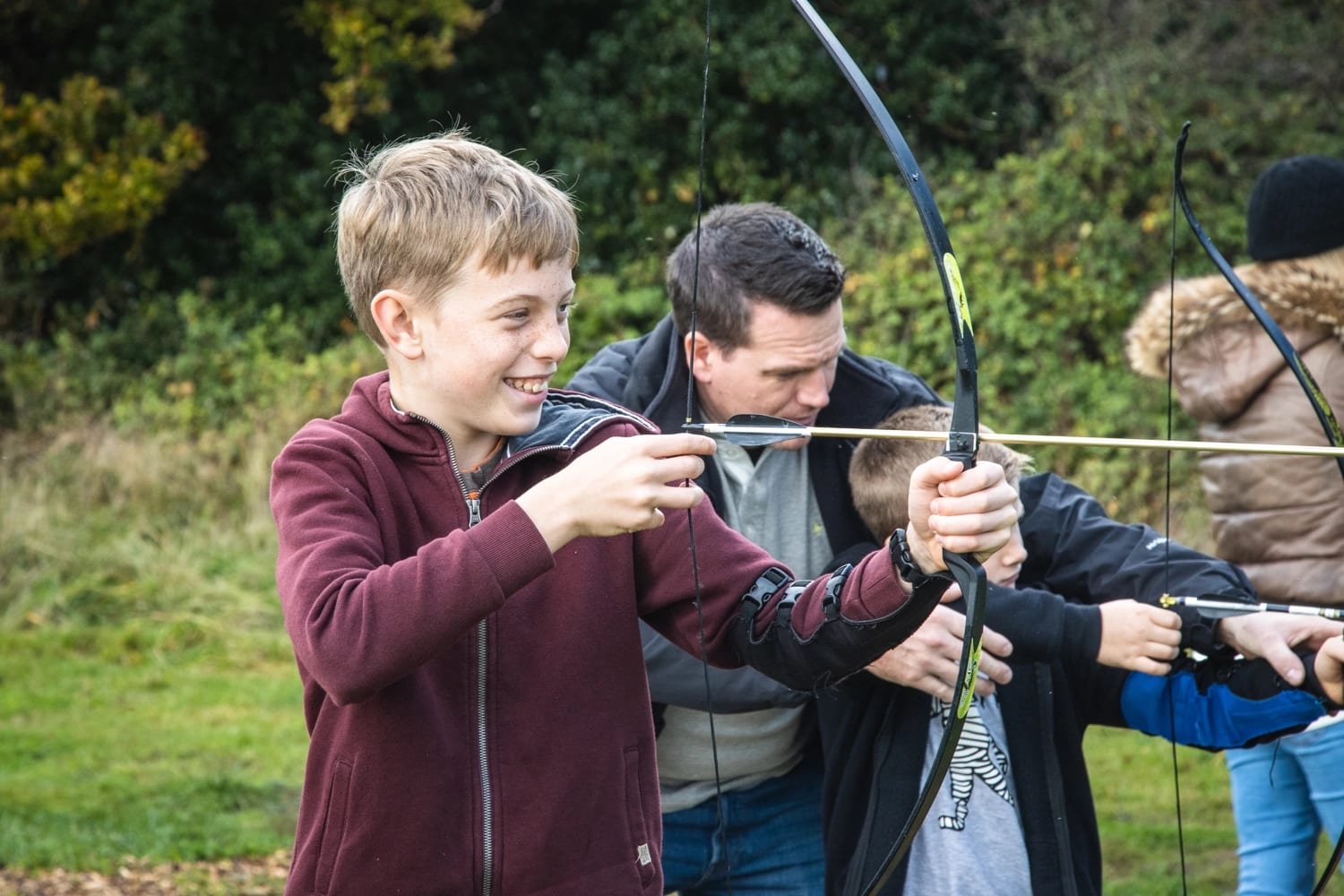 A young boy enjoying a some spooky themed fun during a Halloween Archery session.