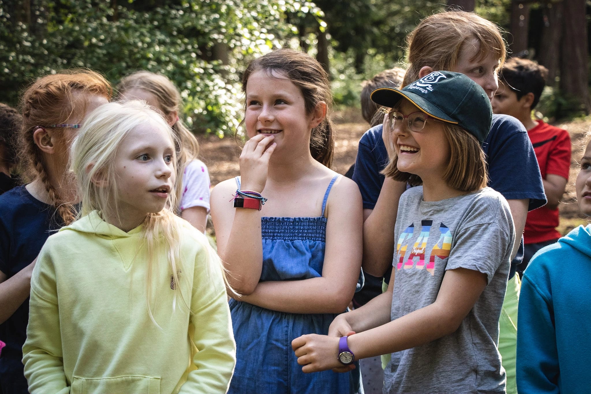 Group of children laughing.