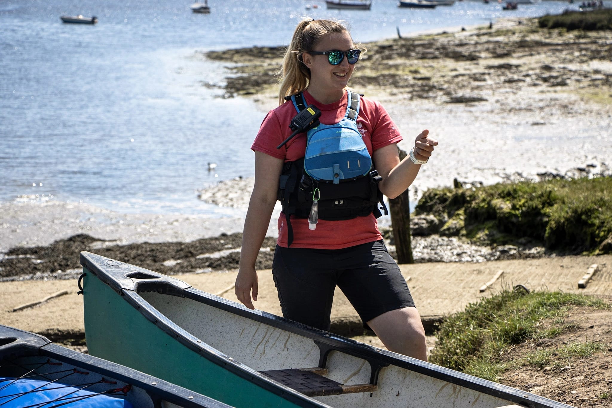 A woman delivering a canoeing session at New Forest Activities