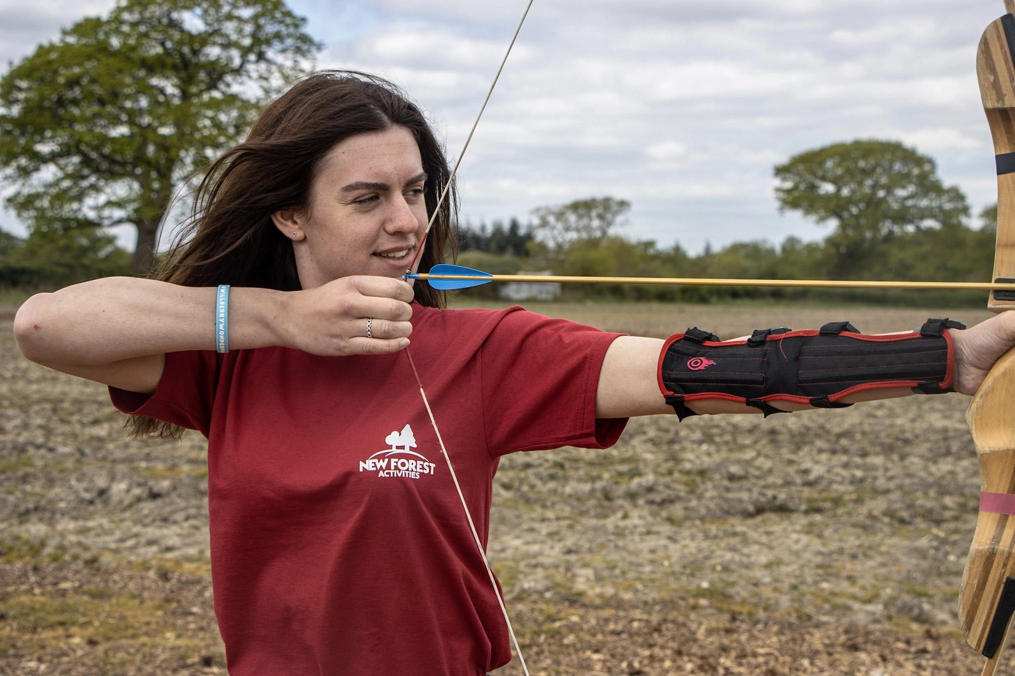 An instructor delivering an archery session