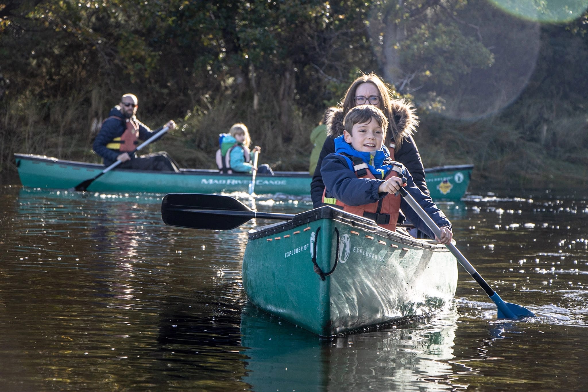 A family paddling on the Beaulieu River as a Mother's Day treat