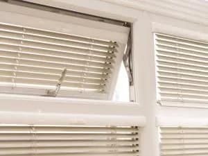 How do I layout my shutters in front of my windows?